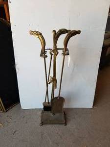 lot 116 image: Horsehead fireplace set