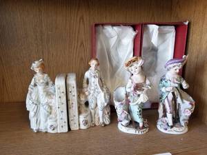 lot 133 image: Ucagco Porcelain figures and a set of porcelain bookends