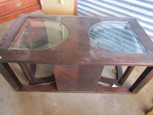 lot 11 image: Ashley coffee table with divided glass top and stow and go incorporated seats,  Dark wood glass with 2 stools that store under 48x26x19