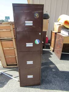 lot 15 image: Brown metal file cabinet 4 drawer 52x15x18