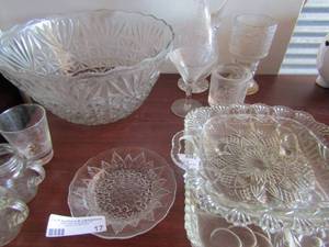 lot 17 image: Star Cut GLASS Punch Bowl, serving platters, flower etched decanter and glasses