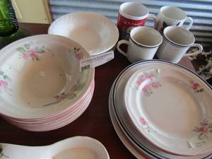 lot 25 image: Gibson Housewares 7 saucers, 6 salad plates, 5 dinner plates. Platter, 7 mugs, 7 bowls and a spoon rest