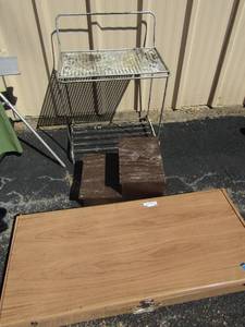 lot 38 image: Metal hinge top case 42x18x6, wood step stool, metal outdoor table 30x23x17