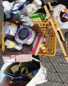 lot 48 image: Small plastic shelf, gift bags and assorted toys