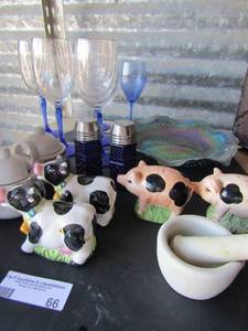 lot 66 image: Glassware lot- Carnival 10 platter, Houston Harvest gift collection sugar & creamer, 5 matching blue stem wine glasses, Cobalt blue S&P set ,Pig, Cow, plus mortar and pestle