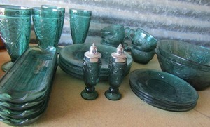 lot 68 image: Emerald glassware set-S&P set, 4 corn holders, 4 Sunday glasses, 4 mugs, 4 plates,  4 dessert plates, 2 salad bowls