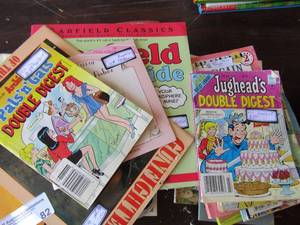 lot 82 image: Childrens paperback books- Garfield, Archie, School Daze and more