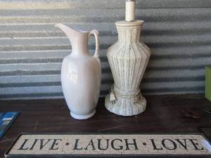 lot 92 image: 26 LIVE, LOVE, LAUGH sign, 30 floral sign on metal, Frankoma Flower vase 16 tall wicker lamp no shade needs repair