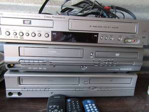lot 96 image: Sanyo DVDVHS combo with remote Magnavox DVDVHS combo with remote, Emerson DVD, VHS combo with remote all unknown working condition