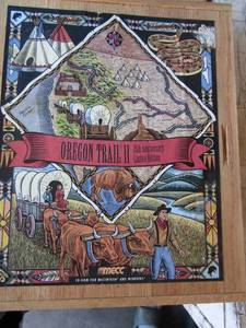 lot 113 image: Oregon Trail guide in wooden box