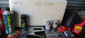 lot 123 image: white Styrofoam chest with fuel gas treatment injector cleaner nails, plumbers pipe glue and more