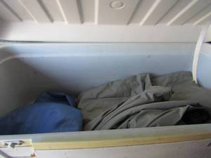 lot 130 image: Queen size intex blow up bed, work out blow up ball inside of igloo ice chest