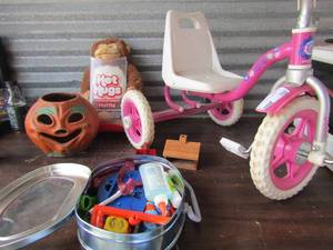 lot 152 image: Barbie 3 wheel bike, pumpkin ,hot hugs teddy bear, school supplies