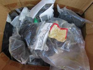 lot 168 image: Box of packages of small black screws. Each pkg. holds 350 screws