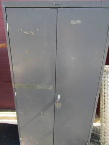 lot 192 image: Double door metal cabinet 5 shelves left door needs pins great shape 72x36x18