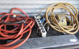 lot 242 image: Multi plug out let, yellow air hose, orange electric hose, Nikon transformer