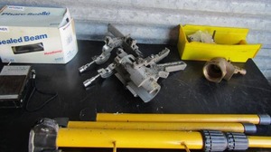 lot 243 image: Yellow metal stand, large flip pen, Wagner 6052 headlight solid state AM-FM handheld radio