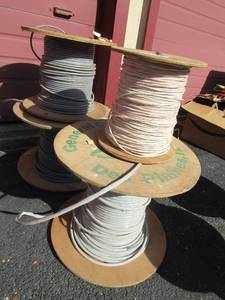 lot 247 image: 4 medium size rolls of gray wire