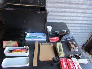 lot 282 image: Black office bag that holds hole punch, penclis,tape dispenser, stapler, file, mini clipboard
