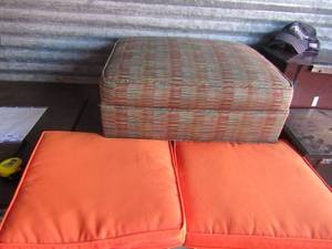 lot 295 image: 2 orange seat cushions  Multi color foot 