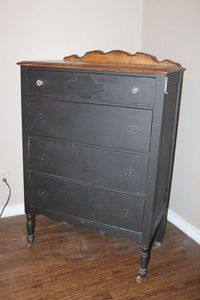lot 33 image: Antique Walnut 4-Drawer Dresser with Wheels (Needs new Drawer Pulls)