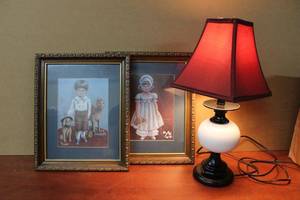 lot 44 image: Small Table Lamp and boy and Girl Decorative Wall  Pictures ( 13 x 16 each