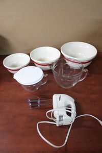 lot 65 image: 2 Pampered Chef MixingMeasuring Bowls, Hand Mixer and Set of 3 Glass Bowls