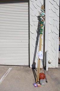 lot 79 image: Misc. Games Lot Volleyball Net, Golf Clubs, Nike Monat Ball Cap, Basketball, Magnetic Links, Math Cards