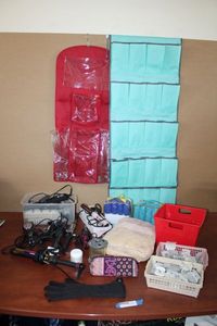 lot 111 image: Beauty Supplies and More Multiple Curling Irons, Hair Clips, Soft Sleep Rollers, Shoe Caddy and More