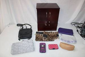 lot 129 image: Jewelry Box, Cosmetic Bags, Maui Jim Glasses Case, and Otter Box