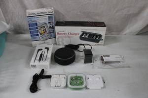 lot 132 image: Universal Battery Charger, Apple iphone earpods, Cobra wireless earbuds, Speaker, Digital Photo Album and more