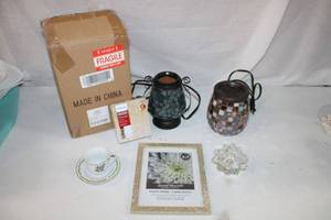 lot 136 image: Decorative Lot Bronze Illuminated Cut-Out Shere (still in Box), Wax Warmer Melt, Glass Paneled Lamp, Truly Tasteful China Cup and Saucer, 5x7 Photo Frame,