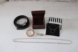 lot 138 image: Jewelry and Belt Lele Sadoughi Circle Necklace, Dickies Leather Belt