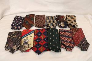 lot 214 image: (12) Novelty & Brand name ties. Includes Zegna, Etienne Aigner, Polo Ralph Lauren, Tommy Hilfiger (3), Golf and nautical themes, A gaming pinball motif tie, Pheasant tie, Kite and cigar motif and more