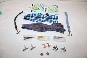 lot 180 image: Mens Jewelry lot. Includes (3) sets cufflinks (one is pink thermoset, one has Mother Of Pearl and one is figural Venus De Milko statue), (3) tie bars (New), (2) sting ray skin nautical bracelets. Also includes (3) Bow Ties