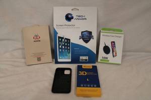 lot 203 image: Wireless Fast Charger , Black, 3D Screen Protectors, Screen protector for Apple iPhone XS and iPhone case. Also includes screen protector for Apple iPad Air HD Clear.