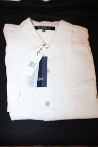 lot 197 image: Quality Nat Nast Luxury Linen shirt. Size XL. Has logo printed buttons NEW WITH TAGS.