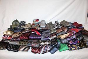 lot 213 image: Box of assorted mens Ties - Assorted makers and styles. About 60 tie. Mostly 100% silk. Tommy Bahama, Joseph A Bank and much more