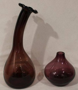 lot 176 image: Vintage Blenko American Art Glass Mid Century Modern Cranberry 14.5 curved Flower Vase. Also includes a Swedish purple art glass vase (Might be Blenko but not confirmed)