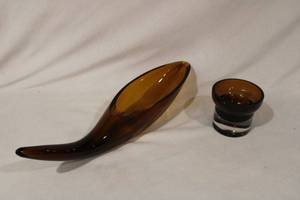 lot 175 image: Blenko Art Glass Cornucopia Horn Dish in Golden Amber. Cica 1950s. Model 964-S. 16.5L x 3H x 4W Designed by Winslow Anderson. Also includes another mid century amber art glass dish (might be Blenko but have not confirmed)