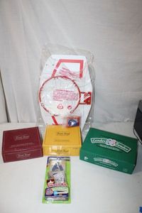 lot 244 image: Toys Trivial Pursuit Games, Gender Bender, Stencil Kit and Basketball Laundry Shoot (still in Packaging)