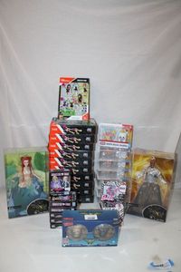 lot 249 image: Toys Dorbz, Wrinkle in Time Barbies, Monster High, Hello Kitty and Waffle Blocks MULTIPLES