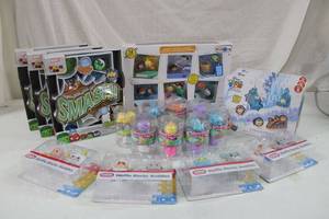 lot 256 image: Toys Marvel Smash Comic Box, JigglyDoos, Waffle Blocks, and  Disney Tsum Tsum