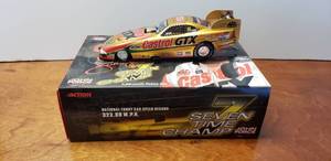 lot 26 image: Action Diecast 124 John Force 7 Time Champion 1998 Mustang Funny Car, Limited Edition