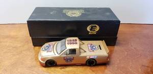 lot 28 image: Action Elite Diecast 124 Nascar 50th Anniversary Gold Ford Truck Bank