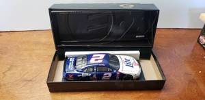 lot 29 image: Action Elite Diecast 124 Rusty Wallace #2 Miller  Elvis 1998 Ford Taurus Elite, Limited Edition