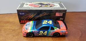lot 40 image: Jeff Gordon #24 DuPont Million Dollar Date 1997 Monte Carlo Diecast Bank