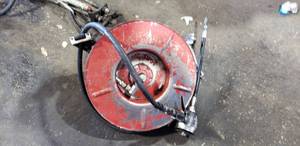 lot 117 image: Retracting Hose Reel w 34 Oil Hose, Meter Gauge Gun & CeilingWall Mount