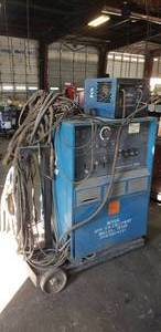 lot 131 image: Miller Syncrowave 300 Tig Welder w Miller Radiator-1 Cooling System w Hoses, Lines, Gun & Heavy Duty Rolling Cart