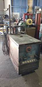 lot 135 image: Hobart R-300 Arc Welder w Hoses, Lines & Heavy Duty Rolling Cart